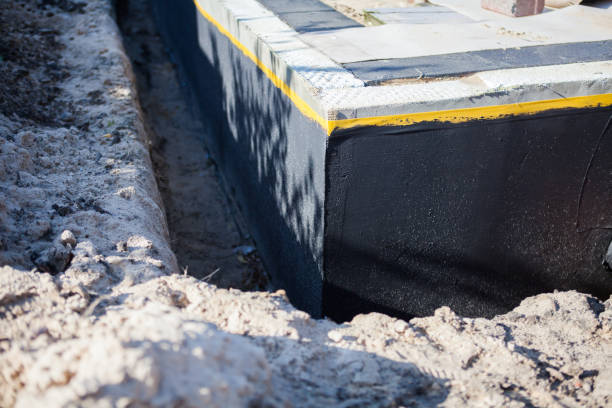 Professional Exterior Waterproofing technician working in Ferrysburg, MI